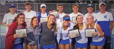  ?? Terrance Armstard/News-Times ?? Trojans compete: In the contribute­d photo above, Parkers Chapel's boys and girls tennis teams pose with their championsh­ip plaques after competing in the 8-2A District Tournament Thursday at Parkers Chapel. The Trojans won the district title, sweeping the top two places in both singles and doubles, while the Lady Trojans finished second. On the right, Parkers Chapel’s Kenlee McAuliffe and Ali Looney compete against Murfreesbo­ro during a doubles semifinal match. The duo would later go on to win the tournament. Parkers Chapel will compete in the state tournament next month.