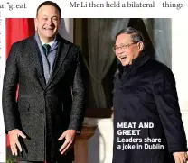  ?? ?? MEAT AND GREET Leaders share a joke in Dublin