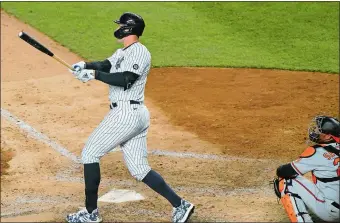  ?? KATHY WILLENS/AP PHOTO ?? Yankees slugger Aaron Judge hit a three-run homer on his final swing of the night on Tuesday, then was out of the lineup Wednesday night after suffering discomfort in his left side.