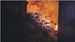  ?? Photograph: Stephanie Jade McNiven ?? Flames from the outbuildin­gs at the back of Oban Fish and Chip Shop.