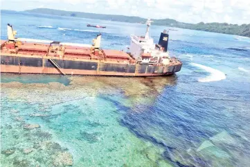  ??  ?? Photo shows the oil spill from the MV Solomon Trader along the coastline of Rennell Island, some 240km south of the capital Honiara. — AFP photo