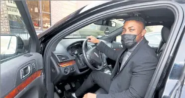  ?? JULIA MALAKIE / LOWELL SUN ?? ‘It’s something that’s afforded me the opportunit­y to work on my own time but also to be around more often than not,’ Uber Black driver Anthony William says.