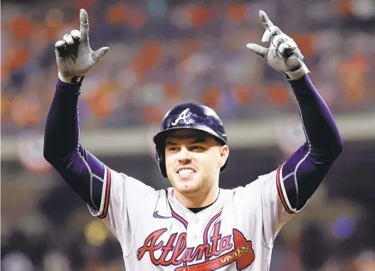  ?? GETTY FILE ?? Longtime Braves star Freddie Freeman finally won a World Series this year but may end up wearing a new uniform next season.