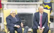  ?? MOLLY RILEY / GETTY IMAGES ?? President Donald Trump meets Wednesday with former Secretary of State Henry Kissinger in the Oval Office at the White House.