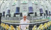  ?? WANG JILIN / FOR CHINA DAILY ?? An employee works on Wednesday at a production line of a textile enterprise in Qingzhou, Shandong province.