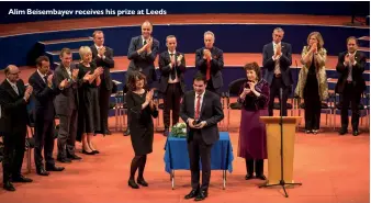  ?? ?? Alim Beisembaye­v receives his prize at Leeds