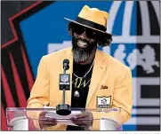  ?? AP/DAVID RICHARD ?? Former NFL player Ed Reed speaks during the Pro Football Hall of Fame induction ceremony Saturday night in Canton, Ohio. Reed was one of four defensive backs in this year’s induction class.