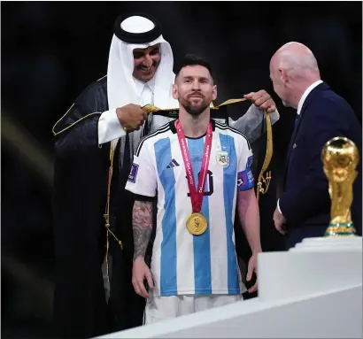  ?? ?? The World Cup in Qatar, won by Lionel Messi’s Argentina, showed that cash remains king in football