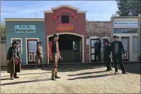  ?? PETER PRENGAMAN — THE ASSOCIATED PRESS ?? Actors are seen reenacting the events that led to an 1881 shootout in the town that left three dead and became one of the most famous gun battles in the Old West in Tombstone, Ariz. Numerous books and movies have been based on the shootout. Tombstone was founded and flourished in the late 19th century after large amounts of silver were found in the area.