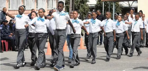  ?? PHANDO JIKELO African News Agency (ANA) ?? HINDLE Road West Primary participat­es in the schools marching and drills competitio­n hosted by the City of Cape Town in Delft yesterday. Five schools took part, with each school guided by a volunteer from the City. |