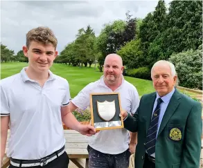  ??  ?? Lansdown Golf Club captain Rod Thomas presents the Junior Trophy to Cameron Stevenson during the Captain’s Day