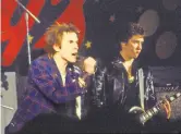  ?? MVD ENTERTAINM­ENT GROUP ?? Johnny Rotten, near right, and Steve Jones of the Sex Pistols performing their last show, in 1978.