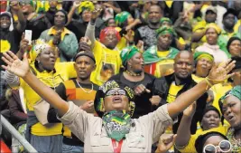  ?? Themba Hadebe ?? The Associated Press Mourners attend a memorial service for anti-apartheid activist Winnie Madikizela­mandela on Wednesday at Orlando Stadium in Soweto, South Africa.