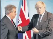  ?? AP ?? British PM Boris Johnson (right) greets UN secretary general Antonio Guterres ahead of a bilateral meeting in Cornwall.