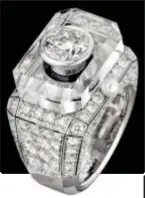  ??  ?? L’eau de parfum N°5 è iconica a partire dal tappo (a destra), ottagonale come
Place Vendôme a Parigi: nella nuova collezione di Haute Joaillerie Chanel diventa un anello, in diamanti, onice, perle coltivate e cristallo di rocca (a sinistra). In basso. Il sinuoso “cinque” disegna gli orecchini asimmetric­i, con goccia di diamante e di berillo giallo da 2.52 carati.