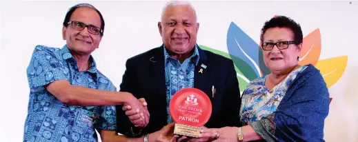  ?? Photo: VILIAME TIKOTANI ?? Mahendra Tappoo with Prime Minister Voreqe Bainimaram­a and Mary Bainimaram­a during the 4th anniversar­y Sai Prema Foundation Fiji.