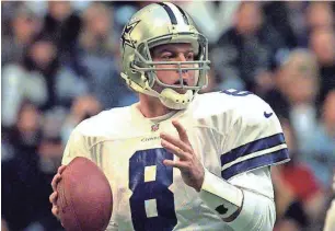  ?? ?? Dallas quarterbac­k Troy Aikman already had three Super Bowl rings before facing Green Bay in November 1996.