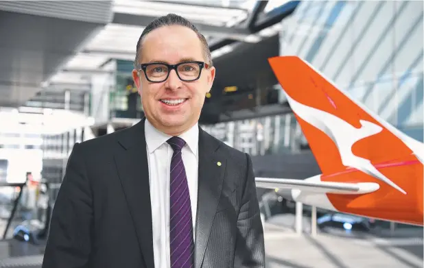  ??  ?? FIRM FLYING: Qantas chief executive officer Alan Joyce poses for a photo after announcing the company's full-year financial results in Sydney,