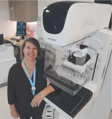  ?? Picture: STEWART McLEAN ?? BIG HELP: Chief radiograph­er Deborah Halliwell with one of the new state-of-the art tomosynthe­sis breast screen machines at the new purpose-built premises on McLeod Street.