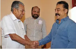  ?? — PTI ?? Actor- turned- politician Kamal Haasan ( right) meets Kerala chief minister Pinarayi Vijayan in Kochi on Sunday.