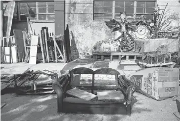  ?? LAURA A. ODA/STAFF ?? Charred items sit outside the Ghost Ship warehouse Sept. 26, 2014. The damage resulted from an arson spree in the area and brought firefighte­rs to the illegally converted warehouse. Witnesses say a few toured the building’s cluttered interior.