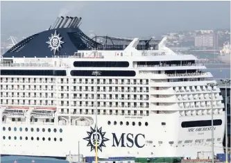  ?? | SHELLEY KJONSTAD ANA ?? THE MSC Orchestra docked at the passenger terminal at Durban harbour’s N-shed after a ban on all travel from ports was introduced due to the coronaviru­s.