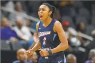  ?? Icon Sportswire via Getty Images ?? Atlanta’s Renee Montgomery reacts after scoring a basket against the Dallas Wings in May 2019. Montgomery will sit out the upcoming WNBA season to focus on social justice issues.