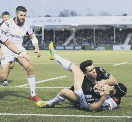  ??  ?? Stand-off Adam Hastings goes over to score Glasgow’s second try of the night against Ulster as the Scotstoun side maintained their place at the top of the Conference A standings.