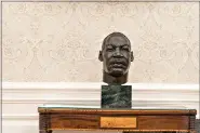  ?? (AP Photo/Alex Brandon) ?? The Oval Office of the White House is newly redecorate­d, including a bust of civil rights leader Rev. Martin Luther King Jr.