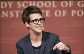  ?? STEVEN SENNE — THE ASSOCIATED PRESS FILE ?? In this file photo, MSNBC television anchor Rachel Maddow, moderates a panel at a forum called “Perspectiv­es on National Security,” at the John F. Kennedy School of Government, on the campus of Harvard University, in Cambridge, Mass.