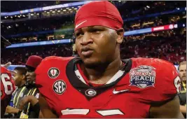  ?? JASON GETZ/ JASON/ GETZ@ AJC. COM ?? Former UGA star Jalen Carter is accused of negligence for his alleged involvemen­t in a fatal street race. He pleaded no contest to traffic charges.