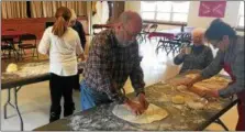  ?? SUBMITTED PHOTO - JIM FARNSWORTH ?? Twenty people of all ages gathered to make fastnaught­s at St. Mark’s Evangelica­l Lutheran Church, Birdsboro, on Feb. 10.