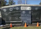  ?? PHOTO COURTESY OF CHUCK HASKIN ?? The marble walls of the Orion Veterans Memorial are starting to come off after eight years in place.