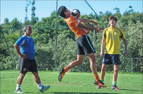  ?? NELSON ALMEIDA / AFP ?? A young Chinese player controls the ball on his chest during a training session at the Luneng Brazil Sports Center in Porto Feliz, some 120 km from Sao Paulo, last month. Chinese Super League club Shandong Luneng has sent a squad of 23 teenage players...