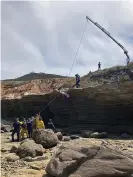  ?? Rescue workers at the scene on Sunday. Photograph: San Diego Fire-Rescue/ZUMA Wire/REX/Shuttersto­ck ??