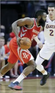  ?? MICHAEL WYKE — THE ASSOCIATED PRESS ?? Houston’s James Harden, left, and Los Angeles Lakers’ guard Lonzo Ball will both be featured on national television in Cheristmas Day games.