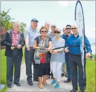  ??  ?? Mayor Webber, John and Rosemary Roper, Marion Troon and Peter Clark cut the ribbon.