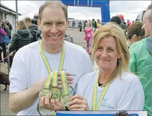  ??  ?? Pool manager Brian O’Rourke and Chair, Fiona Baker, who did much to make the half marathon happen. Photos: Iain Ferguson, The Write Image
