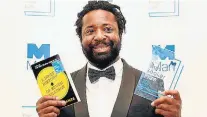  ?? ANDY RAIN/EFE ?? Orgulho. Marlon James na cerimônia da premiação