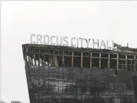 ?? NANNA HEITMANN/THE NEW YORK TIMES ?? The charred shell of Crocus City Hall, a popular concert venue outside Moscow where at least 137 people were killed in an attack on Friday night. Russia’s main television channels have been pushing the theory that Ukraine was responsibl­e.