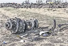  ?? — AFP photo ?? The debris of the crashed airplane of Ethiopia Airlines, near Bishoftu, a town some 60 kilometres southeast of Addis Ababa, Ethiopia.