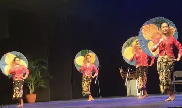  ??  ?? The Cambodian dancers’ performanc­es included a charming group compositio­n with coconut shells used like manjiras, a Komeng Provence choreograp­hy performed annually to a cave spirit with the boys dancing while playing mouth organs, an umbrella dance and...