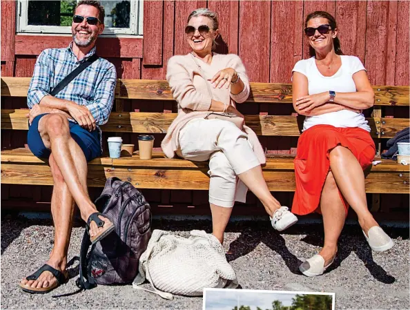  ??  ?? SUNNY OUTLOOK: IBM executive Benedikt Furrer, far left, and psychologi­st Ulrika Thulin, centre, enjoying a coffee with a friend on Fjaderholm­arna near Stockholm