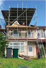  ??  ?? Covered in scaffoldin­g: His house