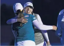  ?? PHOTO: USA TODAY ?? Respectful rivals . . . Swede Pernilla Lindberg (right) and South Korean Inbee Park hug during the unfinished playoff at the ANA Inspiratio­n at Mission Hills in California yesterday.