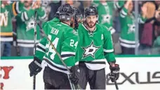  ?? JEROME MIRON, USA TODAY SPORTS ?? The Stars’ Jordie Benn and Tyler Seguin, right, enjoy a Seguin goal. Scoring is at its highest since the 2005-06 season.