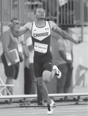  ?? LUCAS OLENIUK/TORONTO STAR ?? Andre De Grasse wasn’t sure he’d won the Pan Am 200-metre final until the results screen flashed.