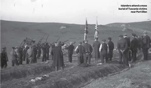  ?? PICTURE: MUSEUM OF ISLAY LIFE ?? Islanders attend a mass burial of Tuscania victims
near Port Ellen