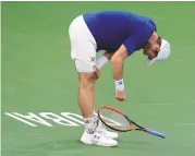  ?? ASSOCIATED PRESS ?? Andy Murray of Great Britain reacts after losing a point to Ugo Humbert of France during Wednesday’s match in Dubai.