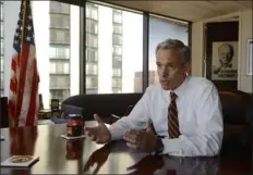  ?? ANDY CROSS — THE DENVER POST ?? John Walsh discusses a case in his office while serving at the U.S. Attorney for Colorado on July 25, 2014.